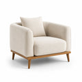Fauteuil en tissu beige avec cadre en bois de chêne